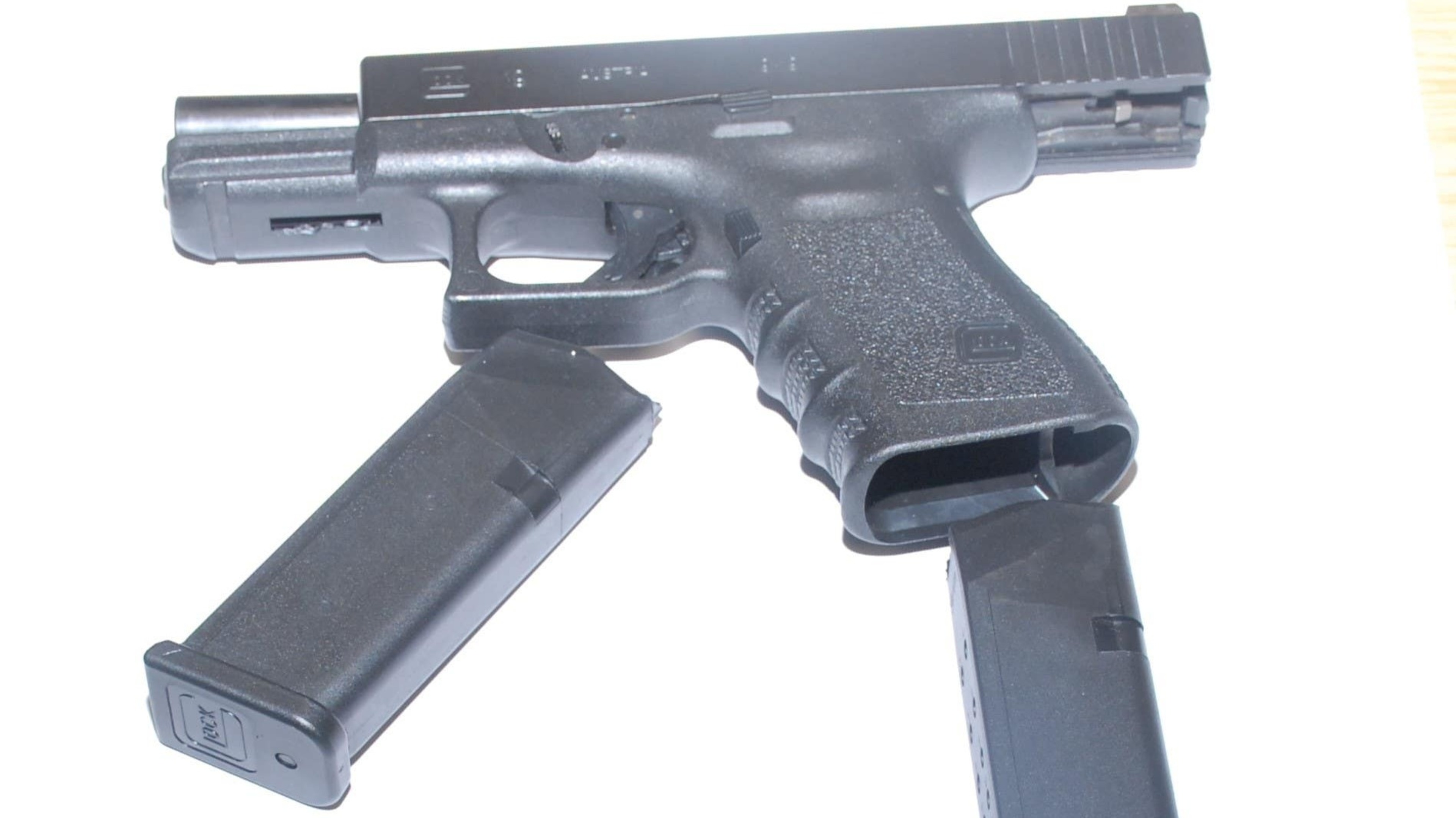 Man and woman arrested after gardai find guns and ammunition during search