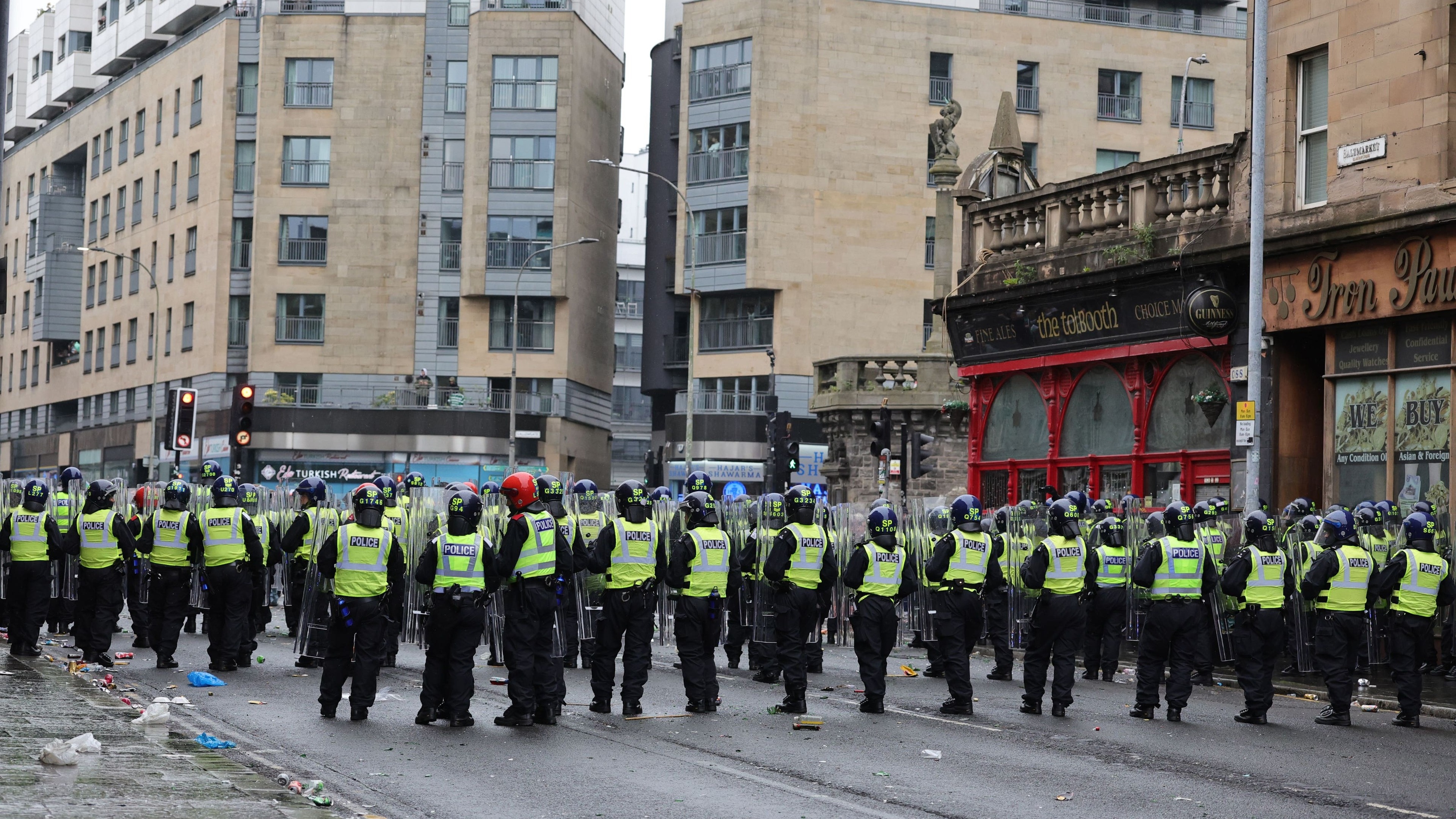 Police disperse crowds after Celtic win in Glasgow’s Trongate area