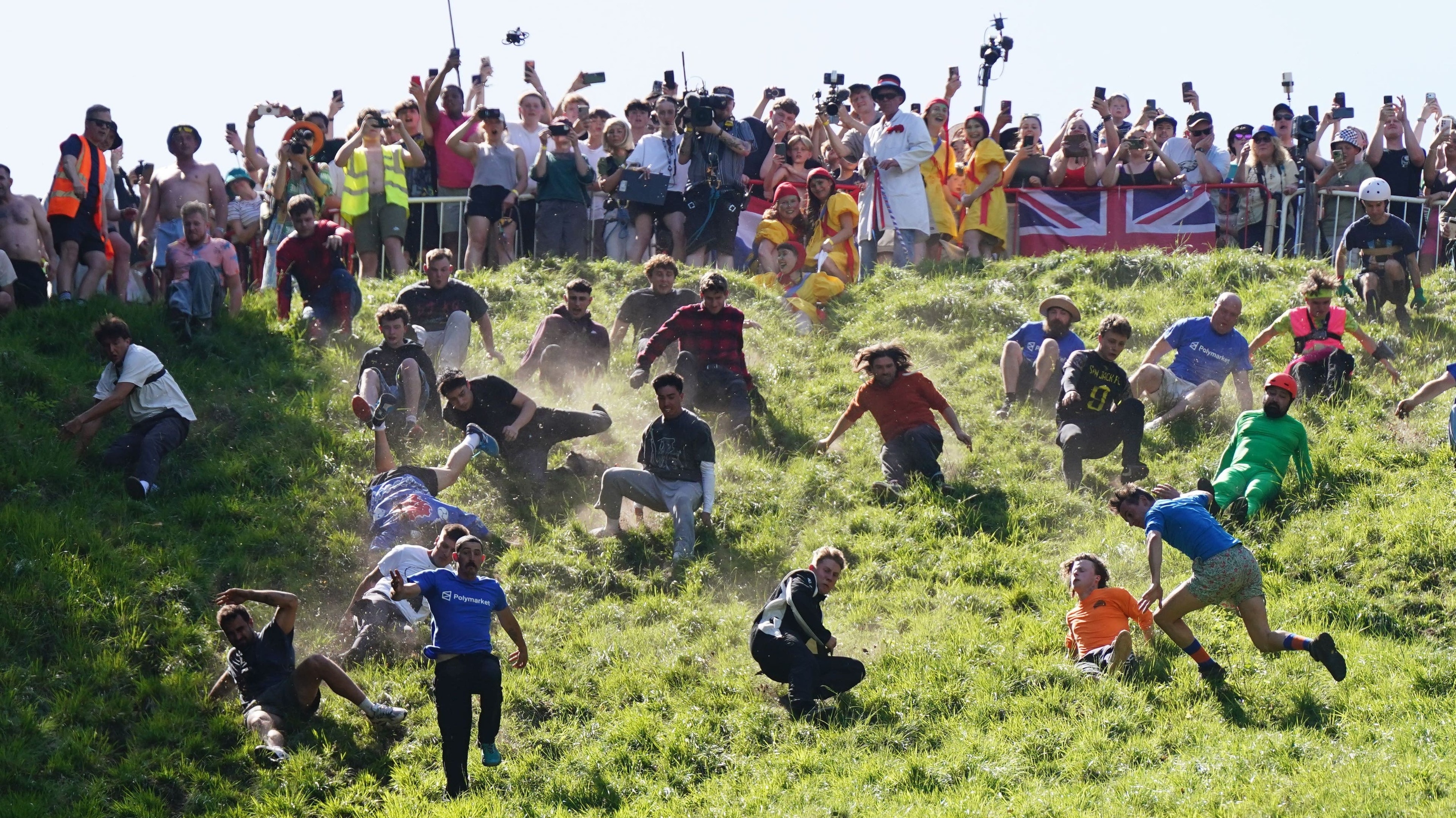 German YouTuber pips local man to win Gloucestershire cheese-rolling contest