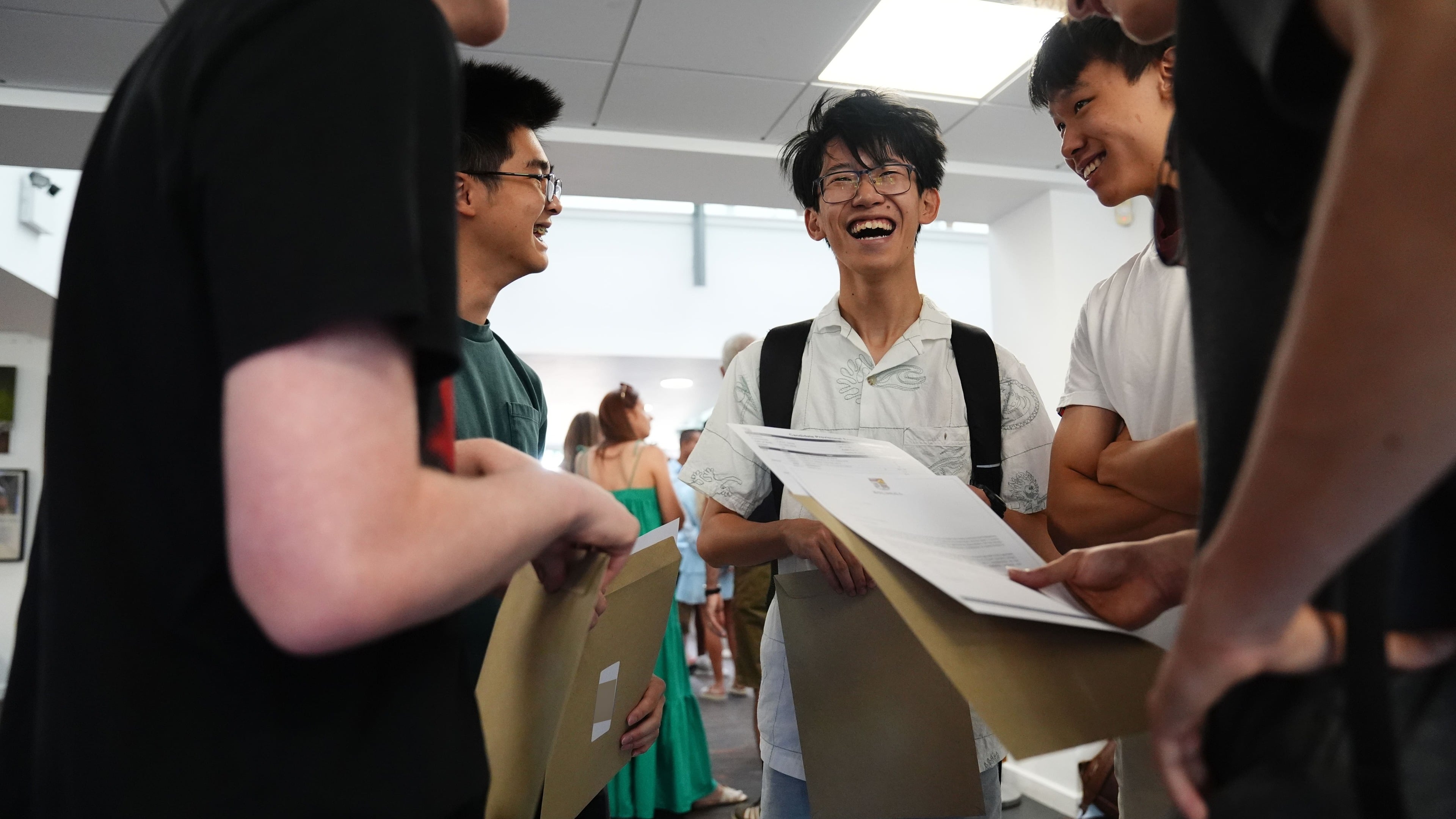 A-level top grades rise for third year as entries exceed 900,000