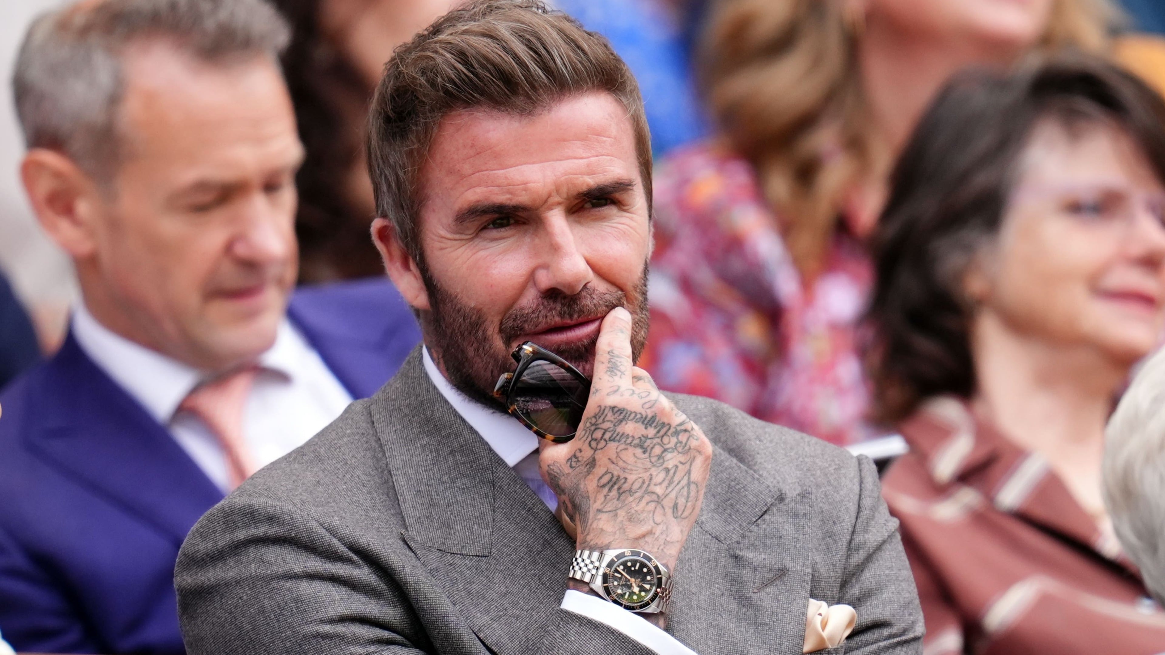 Wimbledon opens in sunshine as hundreds of thousands attend