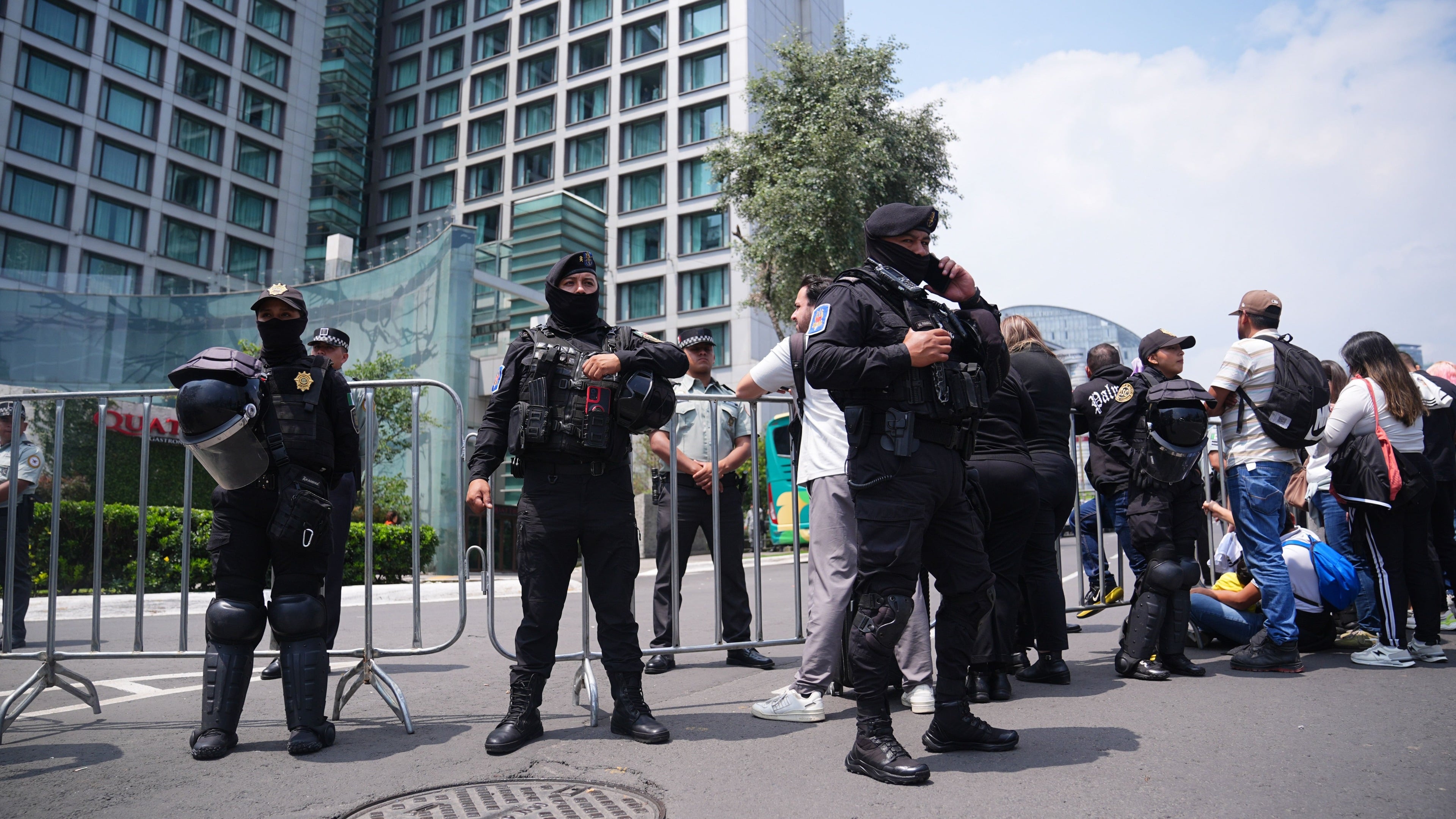 Over 100 riot police guard England hotel after hostile reception in Mexico