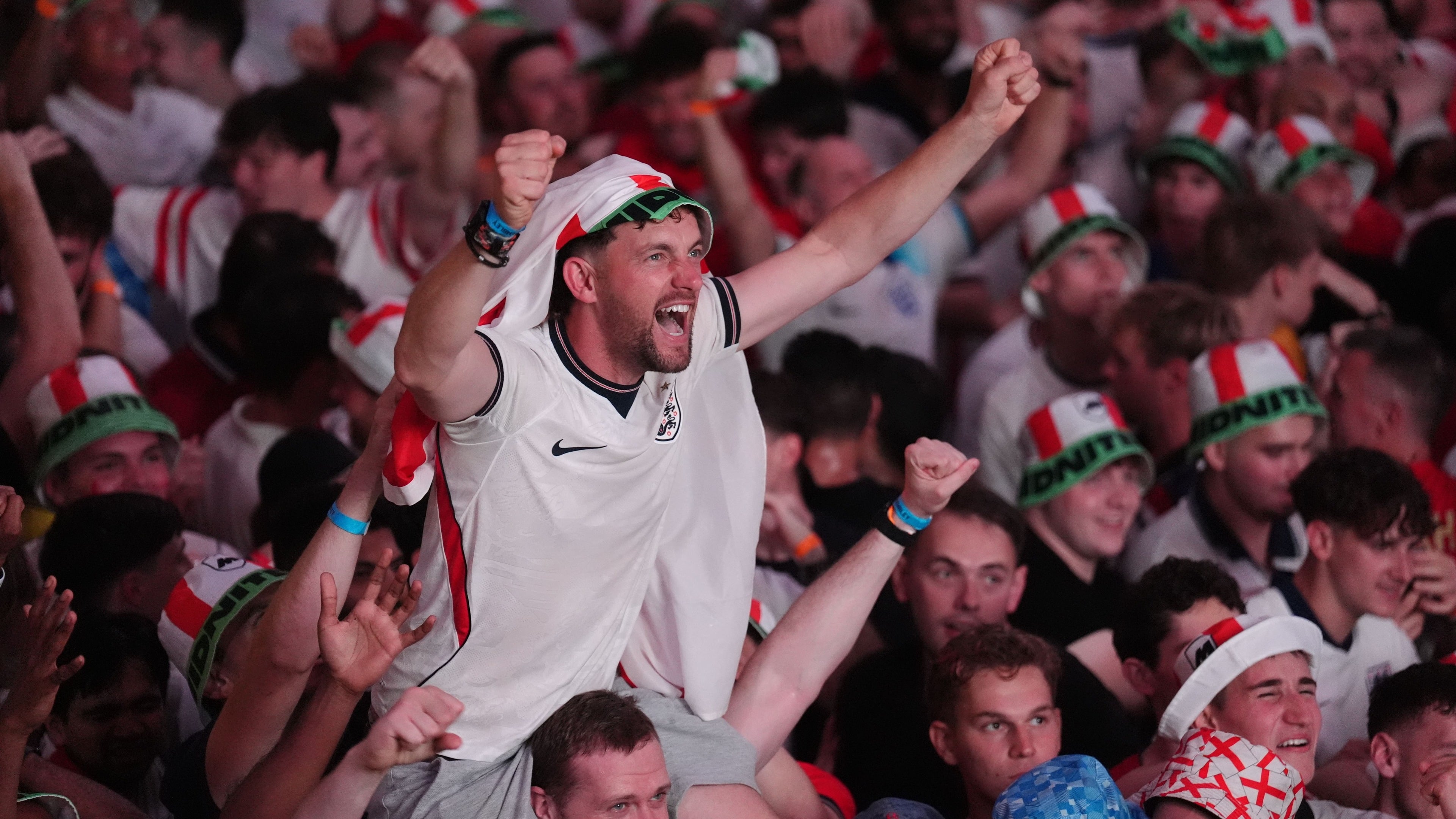 Fans celebrate as Anthony Gordon gives England the lead