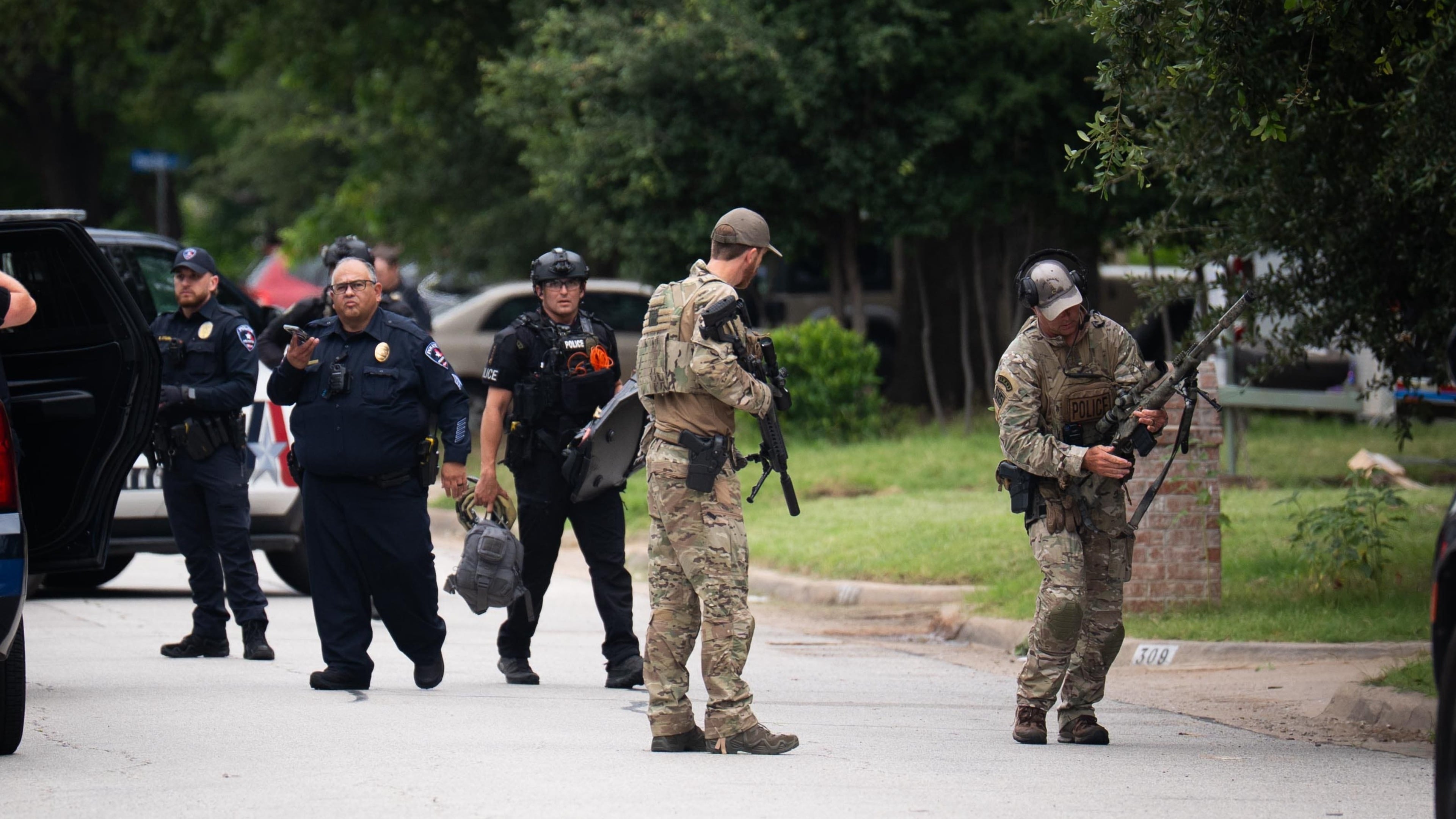 SWAT deployed as armed police respond to incident near England World Cup venue
