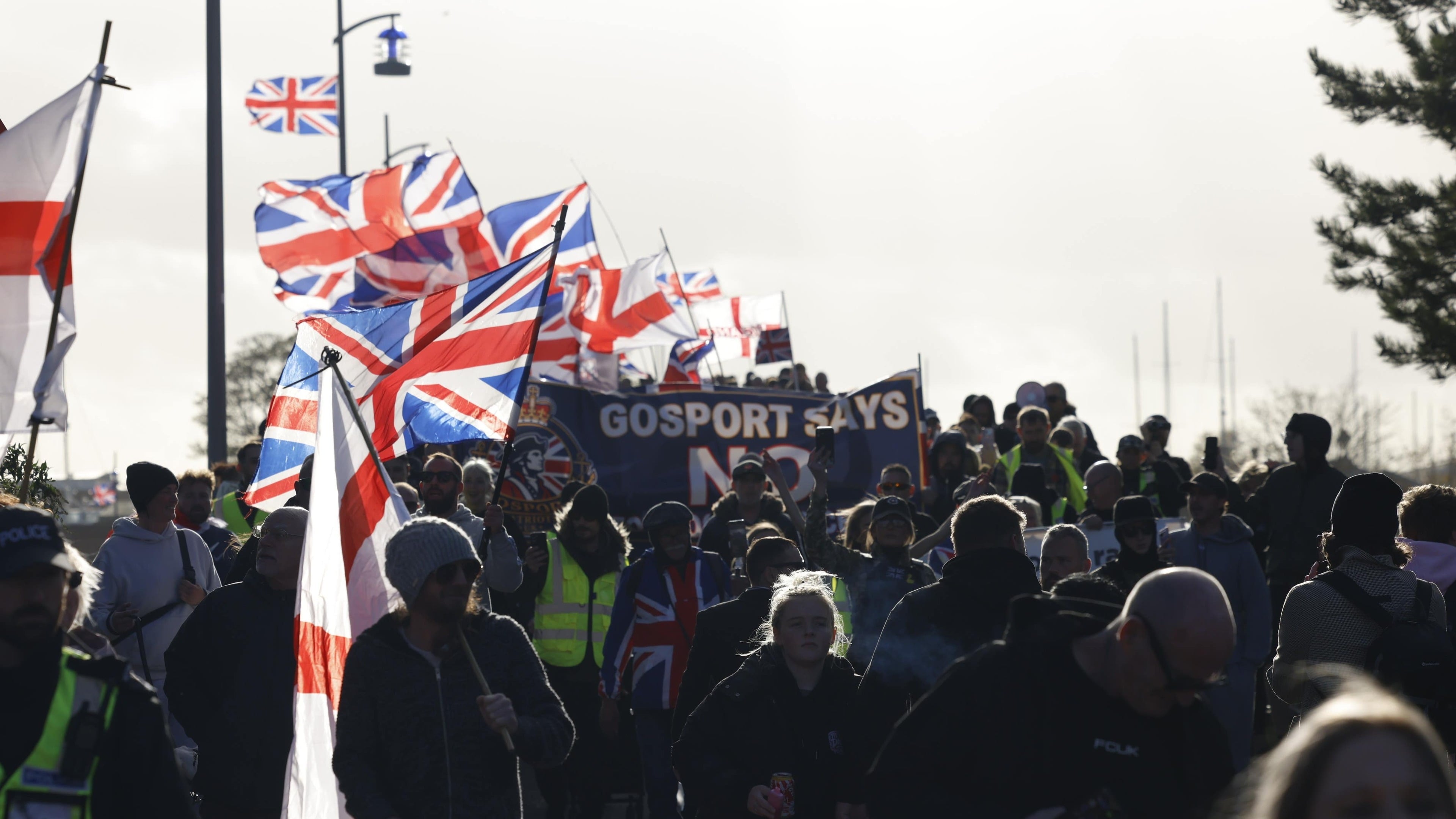 Hundreds join anti-migrant march near planned immigration removal centre