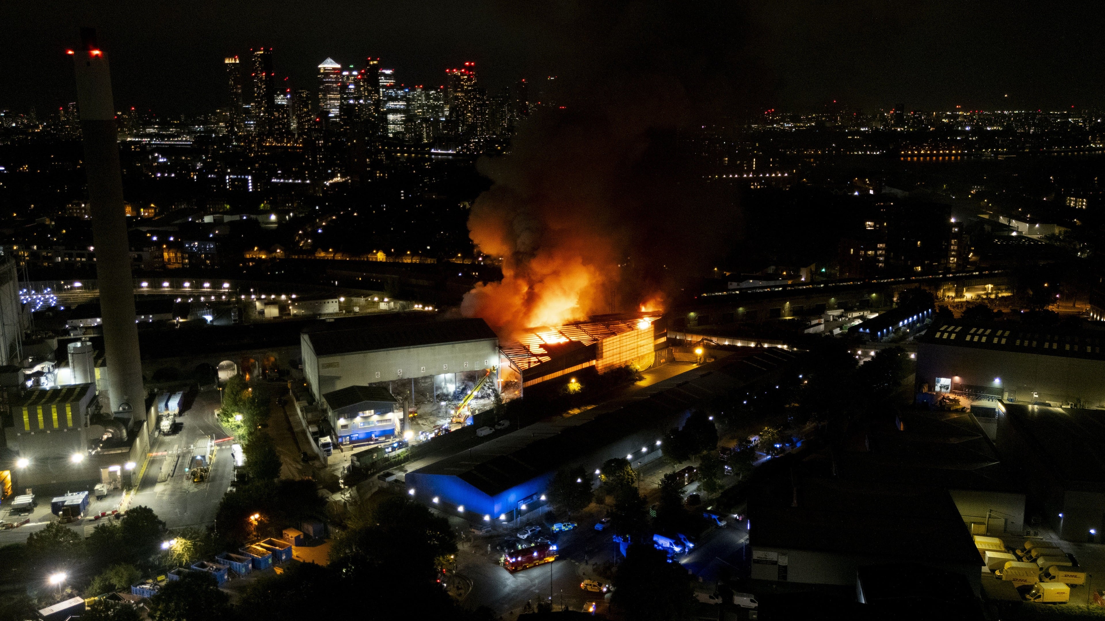 About 100 firefighters tackle blaze at recycling facility