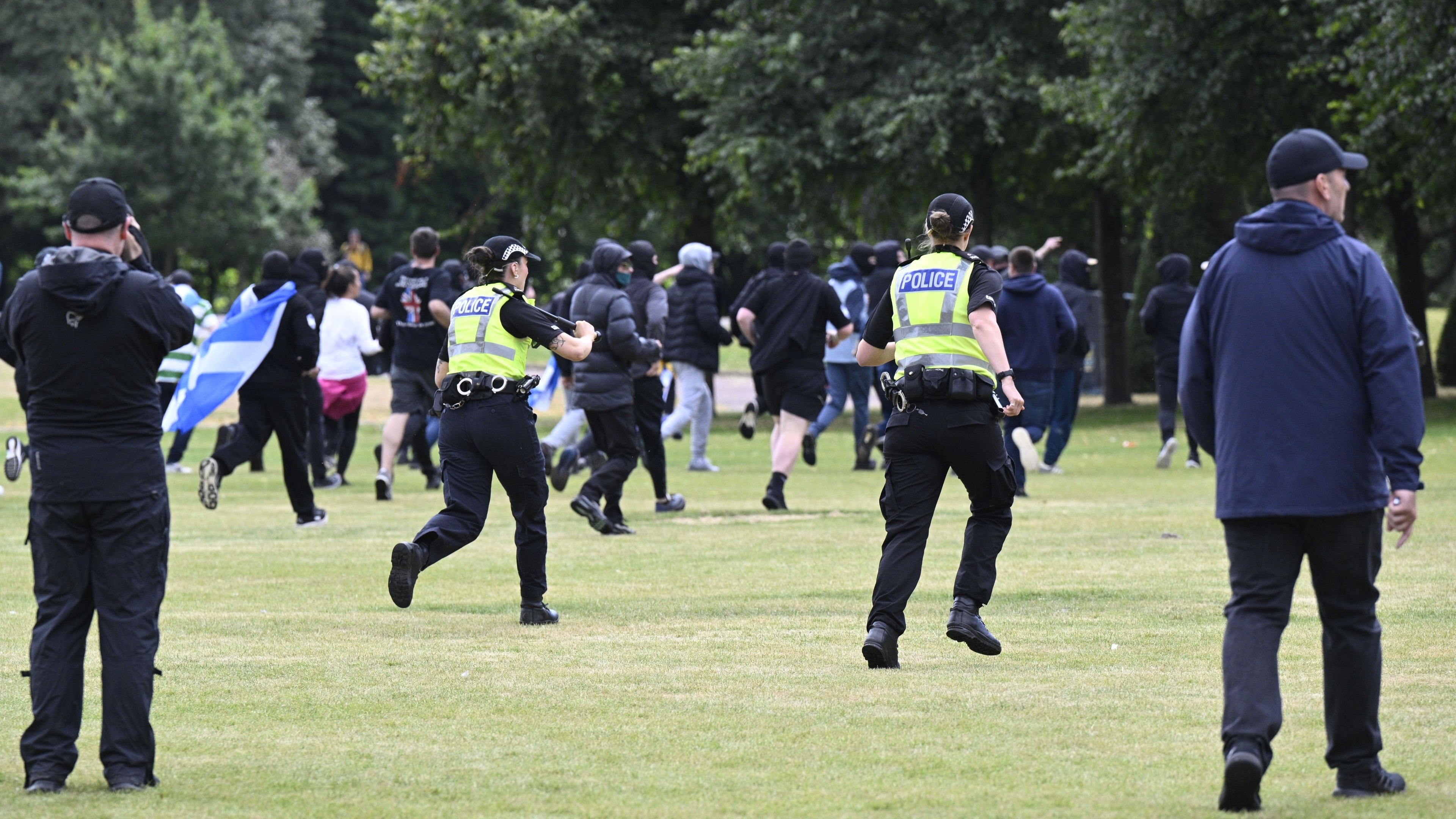 Police vow to catch violent offenders during Glasgow migration protest