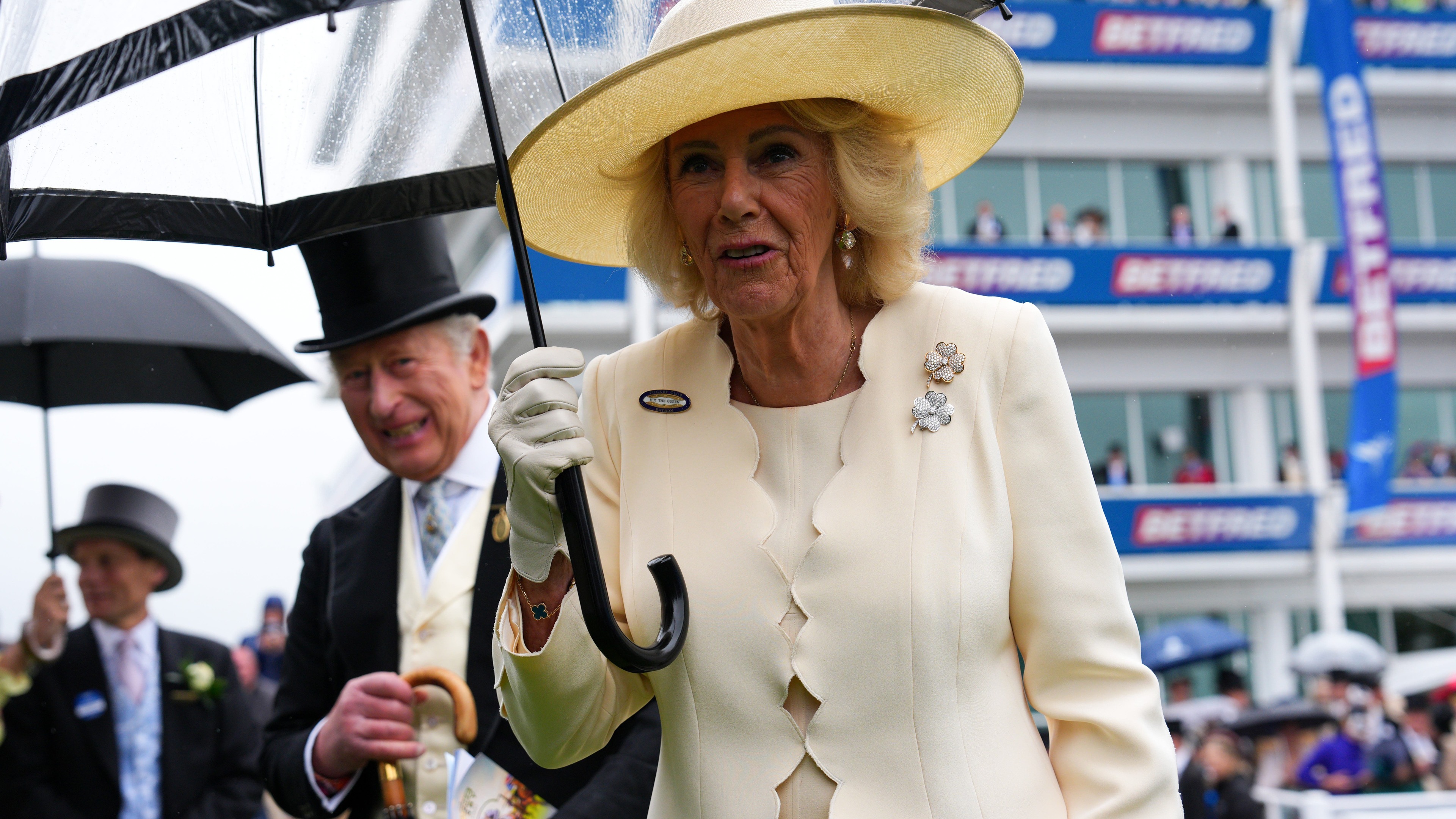 King and Queen attend Epsom Derby, joining crowds despite heavy rain