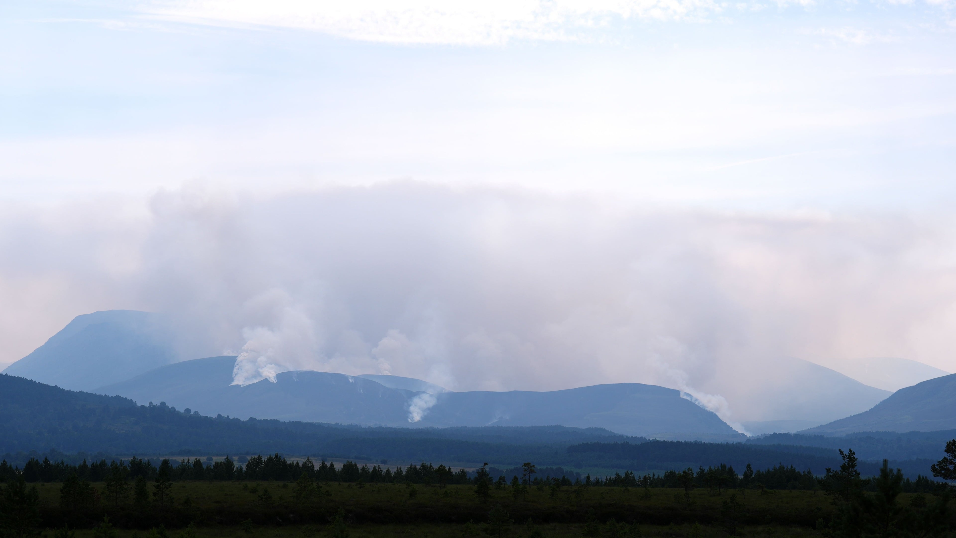 Helicopter deployed as firefighters continue battling Cairngorms wildfire for third day