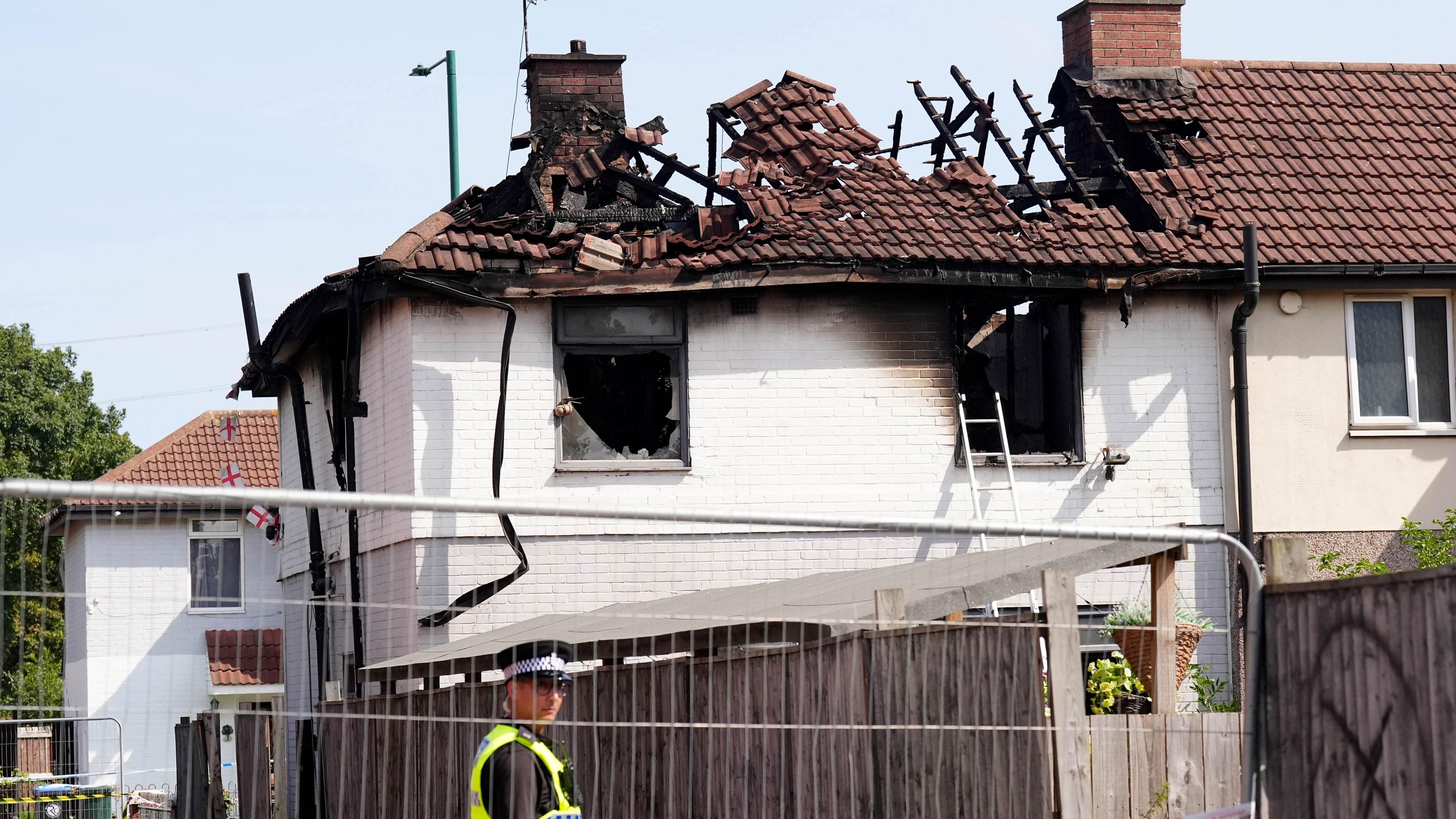 Man, 23, charged with two counts of murder after fatal house fire