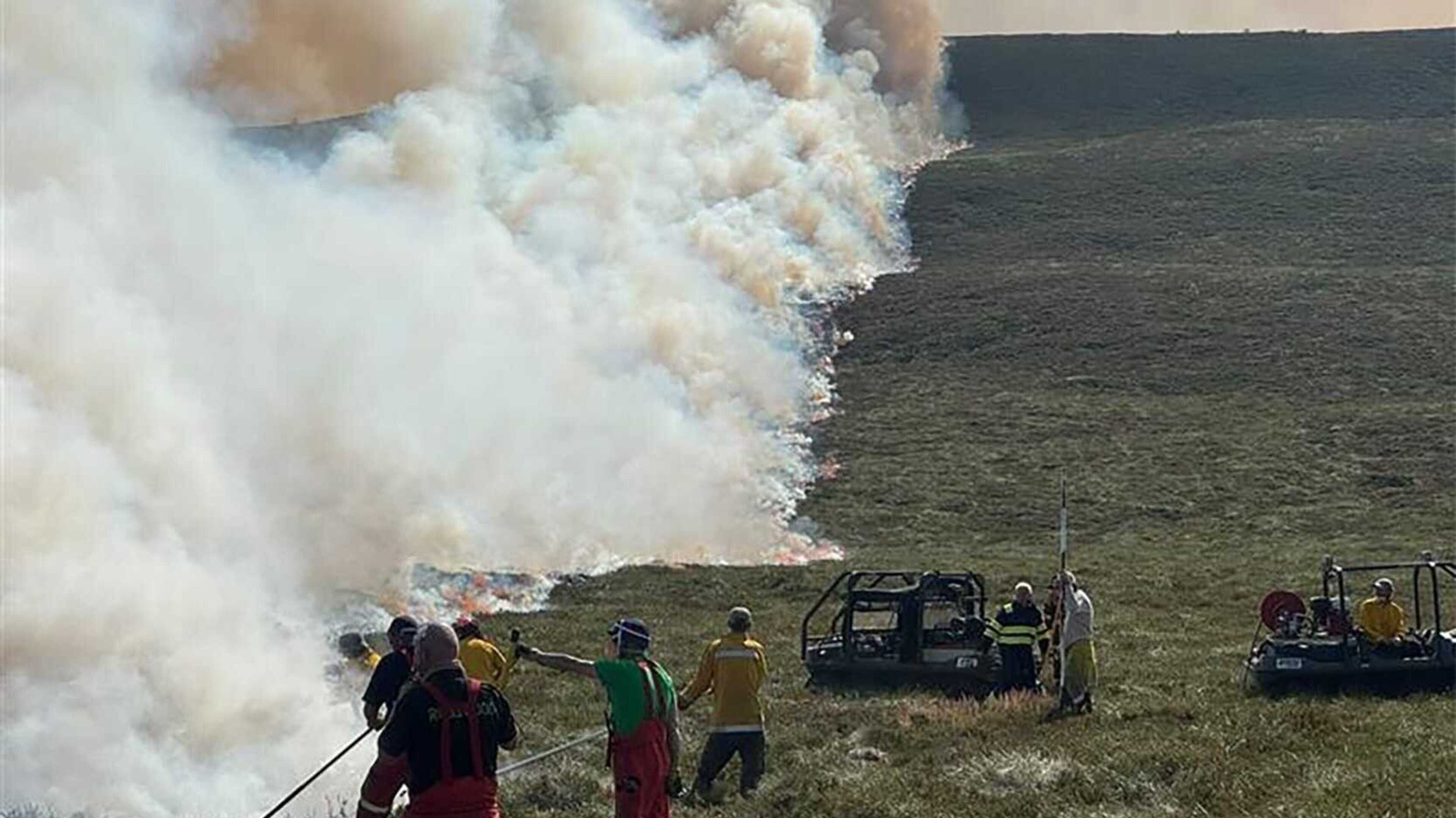 Firefighters continue tackling wildfire as evacuations remain in place