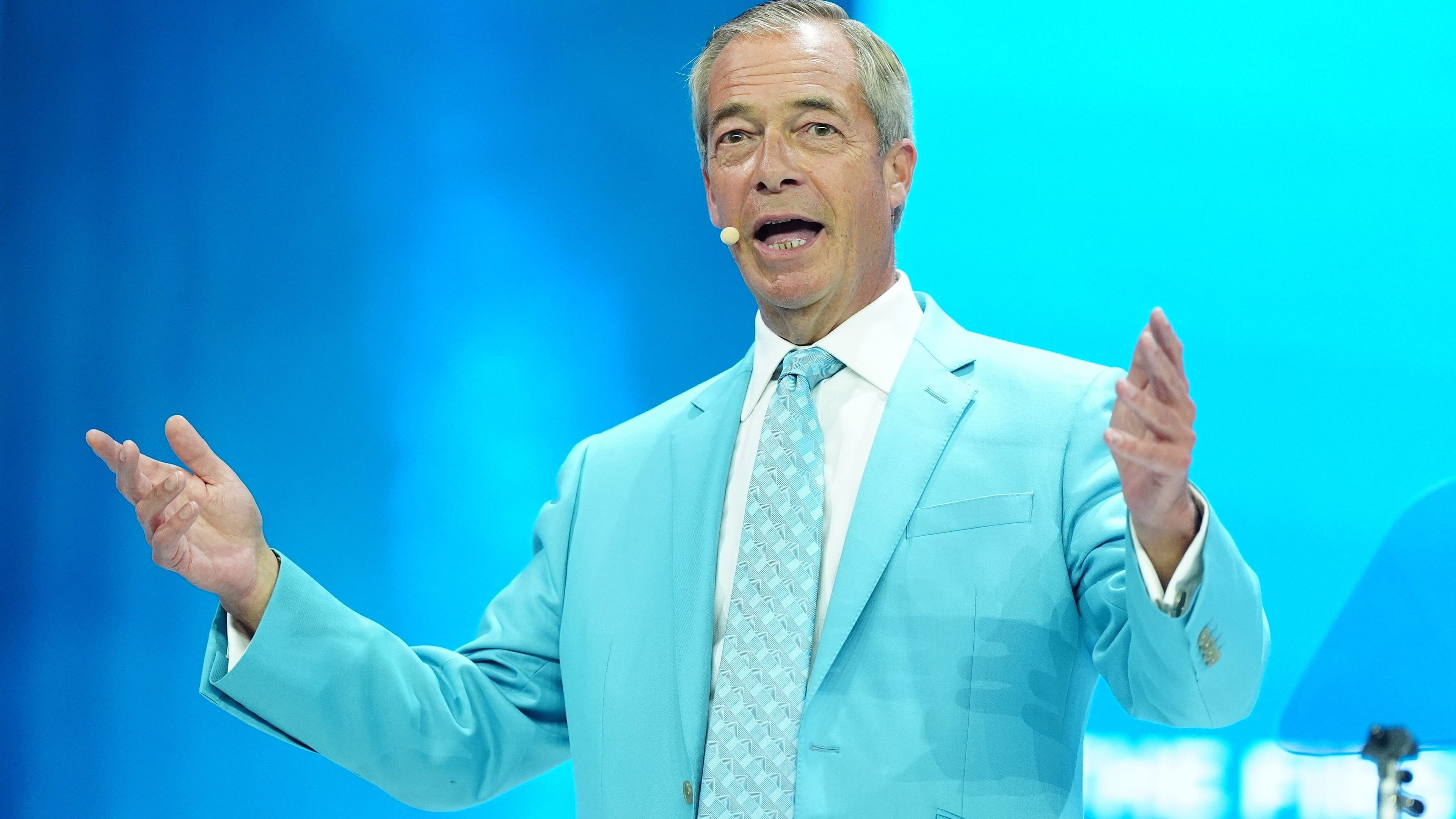 Farage calls for ban on face coverings in public after anti-migration protests