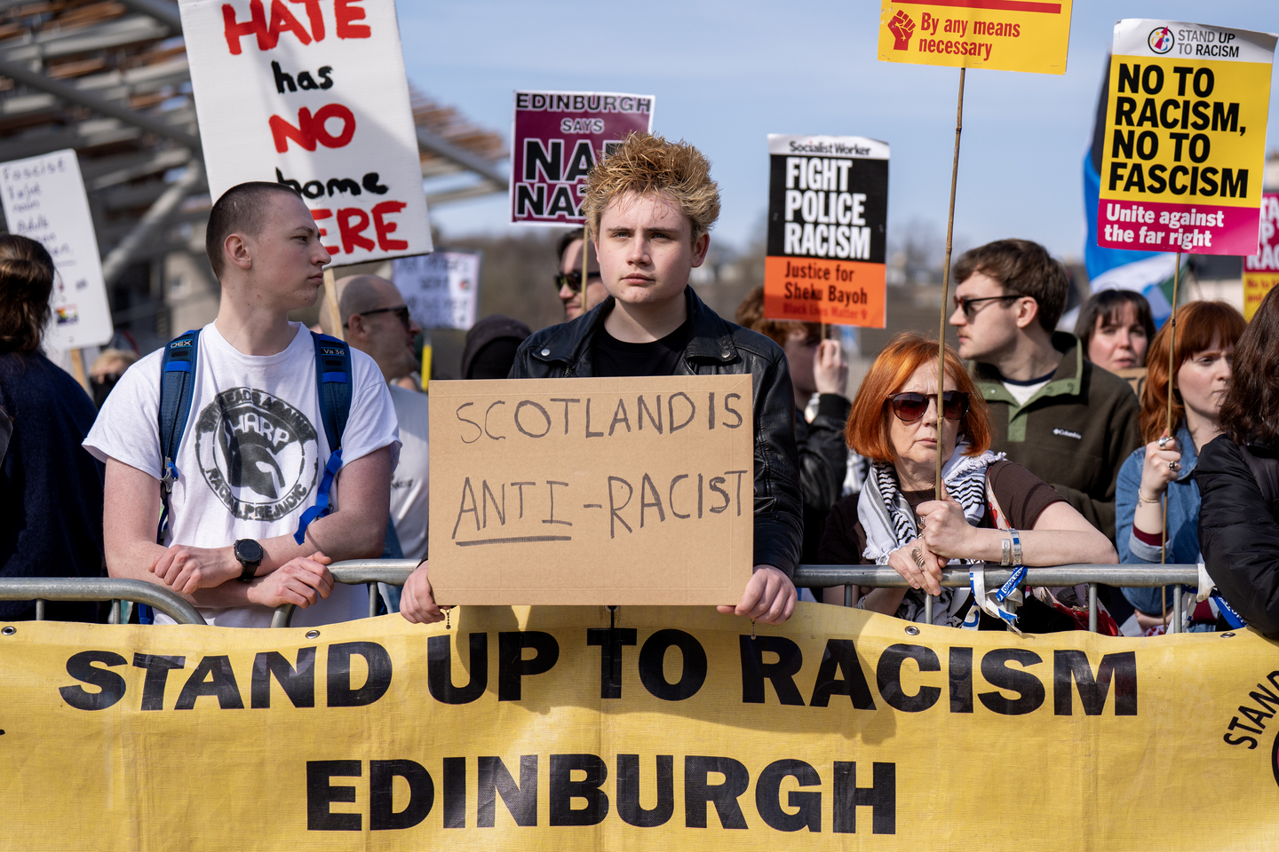Police keep opposing groups apart as anti-immigration rally held at ...