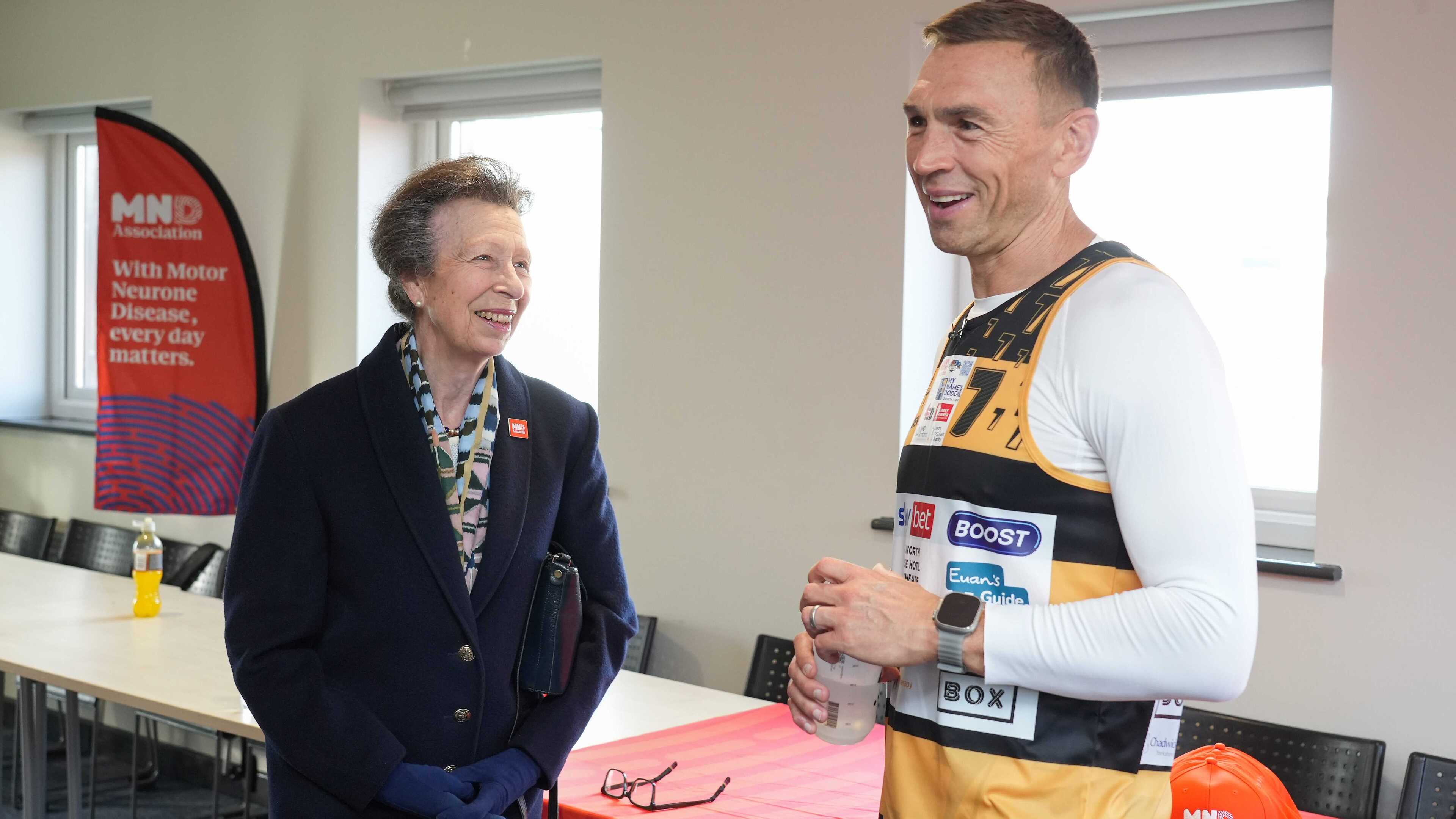 Princess Royal jokes with Sir Kevin Sinfield during charity ultra-marathon challenge