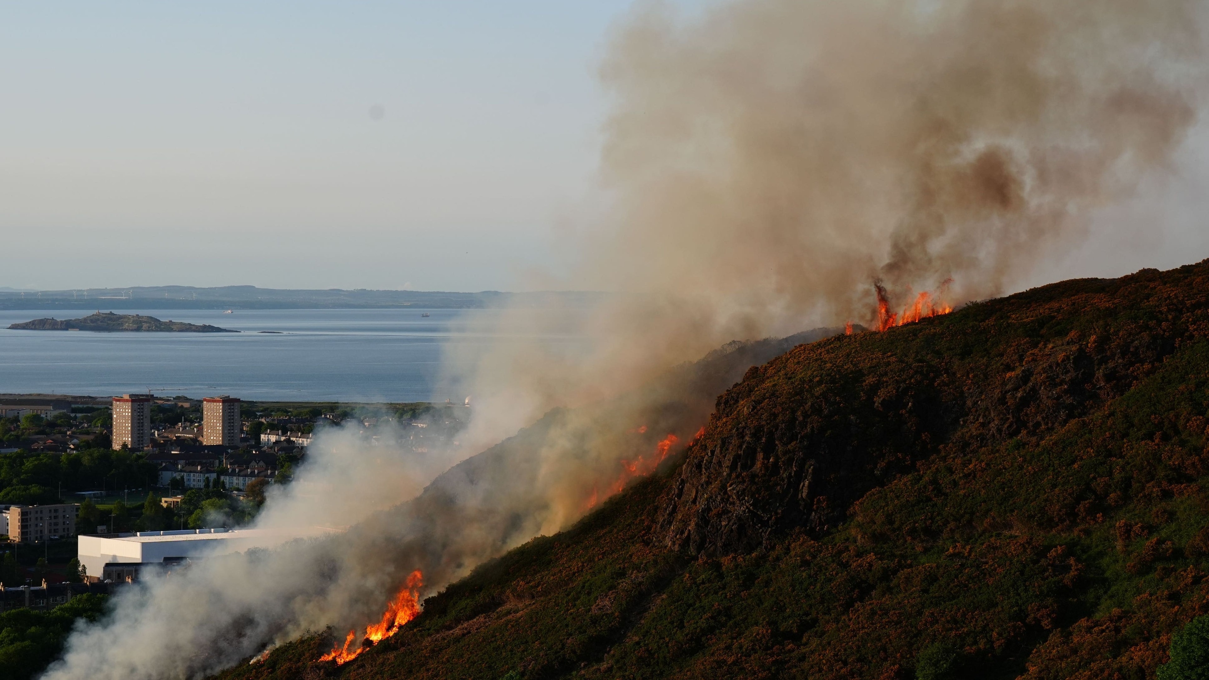 Firefighters tackle grass fire through the night near Arthur’s Seat