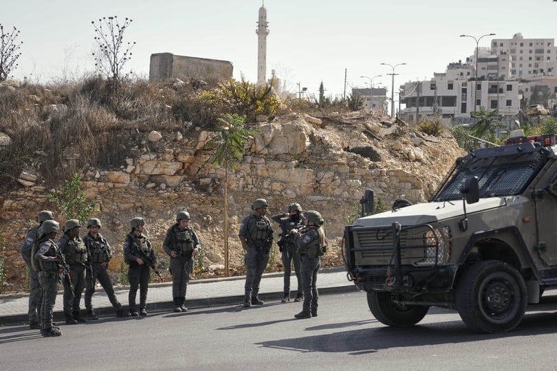 The move followed an attack carried out by Palestinian gunmen at a junction near Hebron in the occupied West Bank (AP)