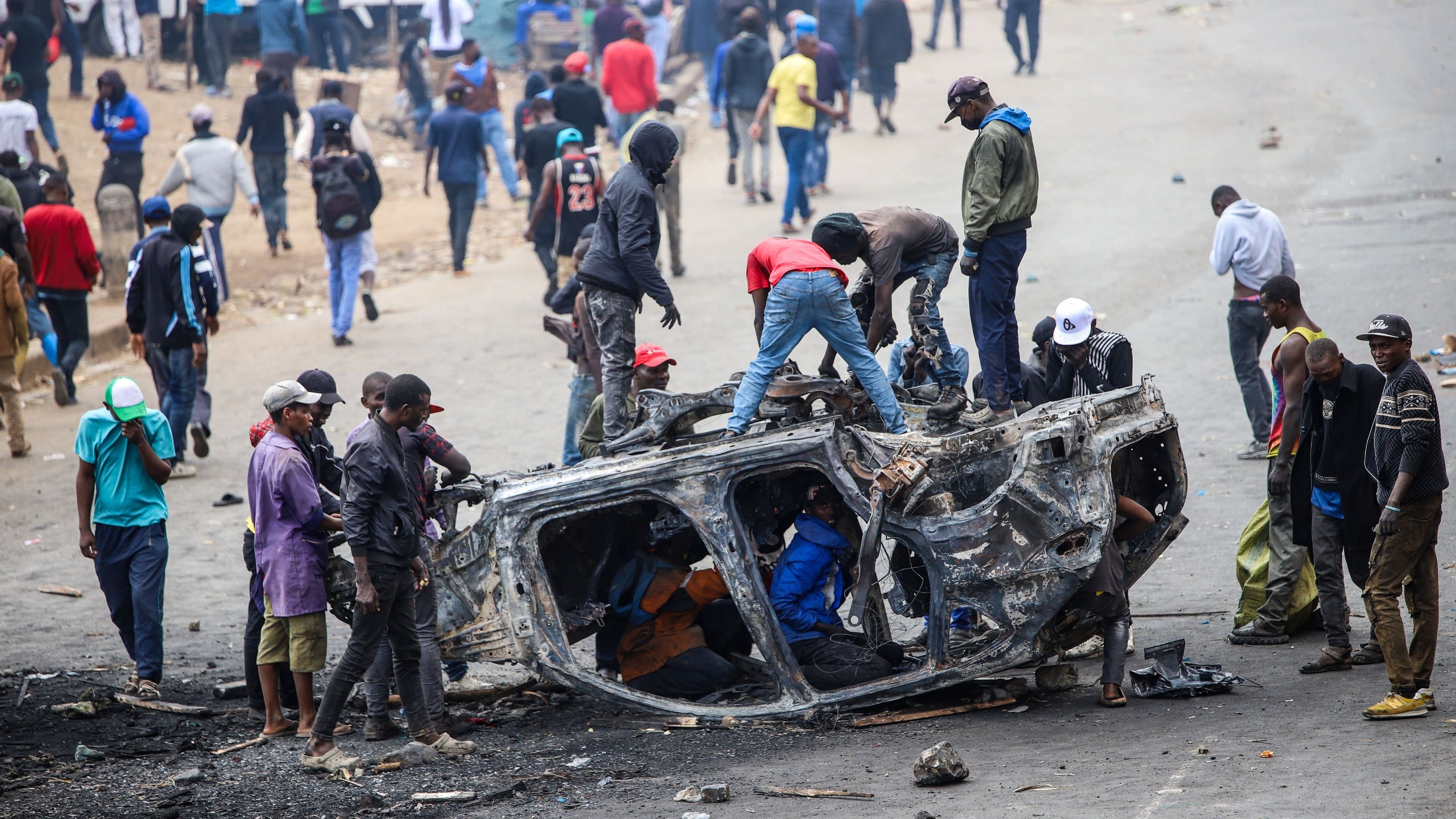 Four people killed and dozens injured in Kenya protests over record fuel prices
