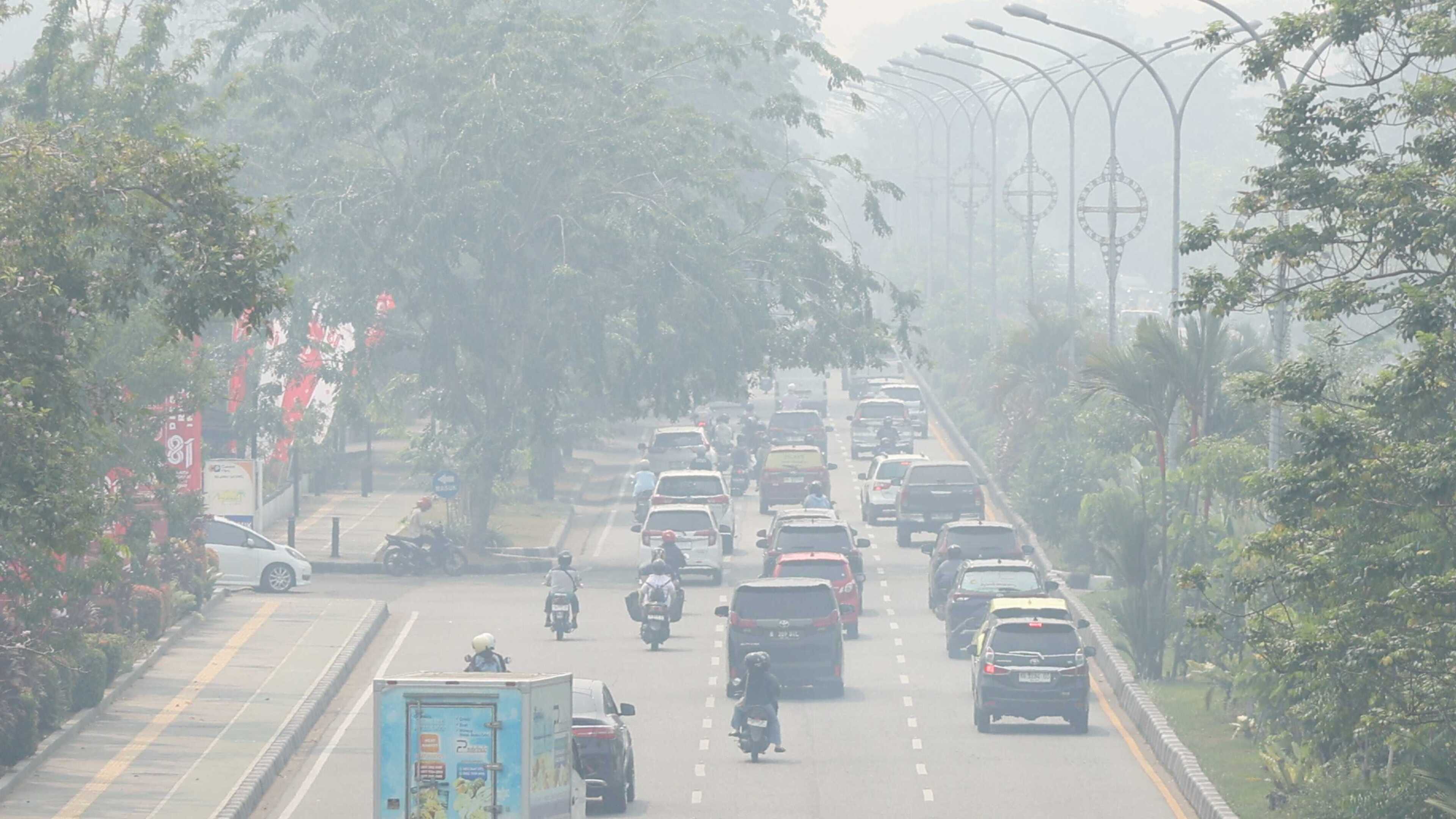 Indonesia warns against open burning as wildfire haze spreads to Malaysia