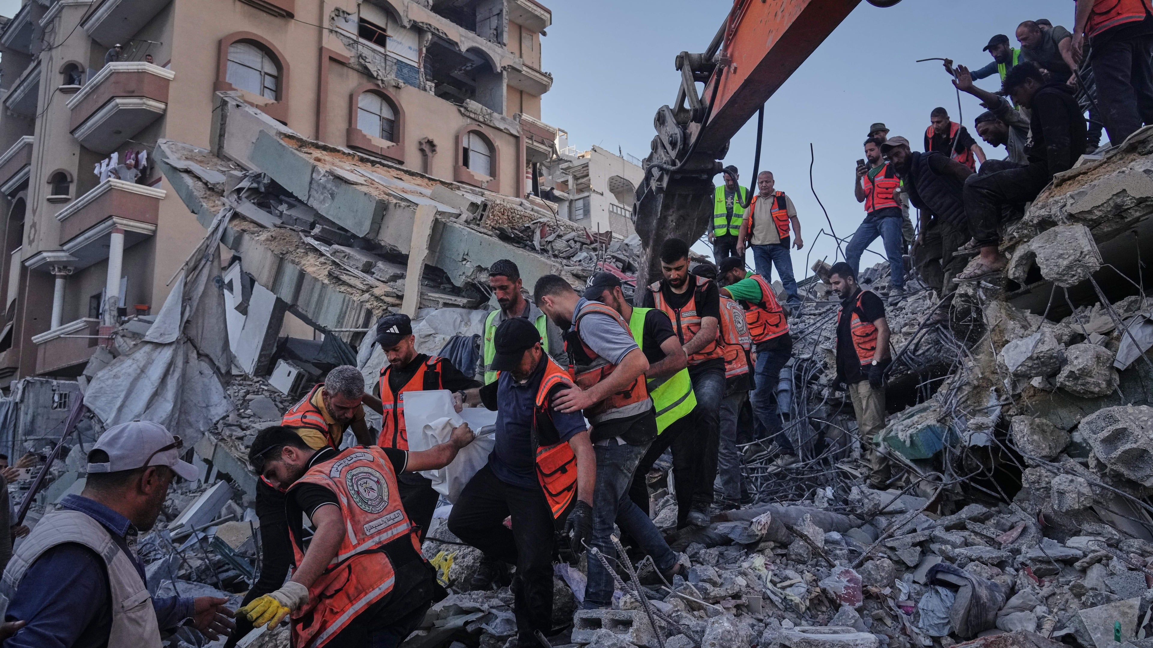 Building collapses in Gaza City kill at least 12 as child deaths reported