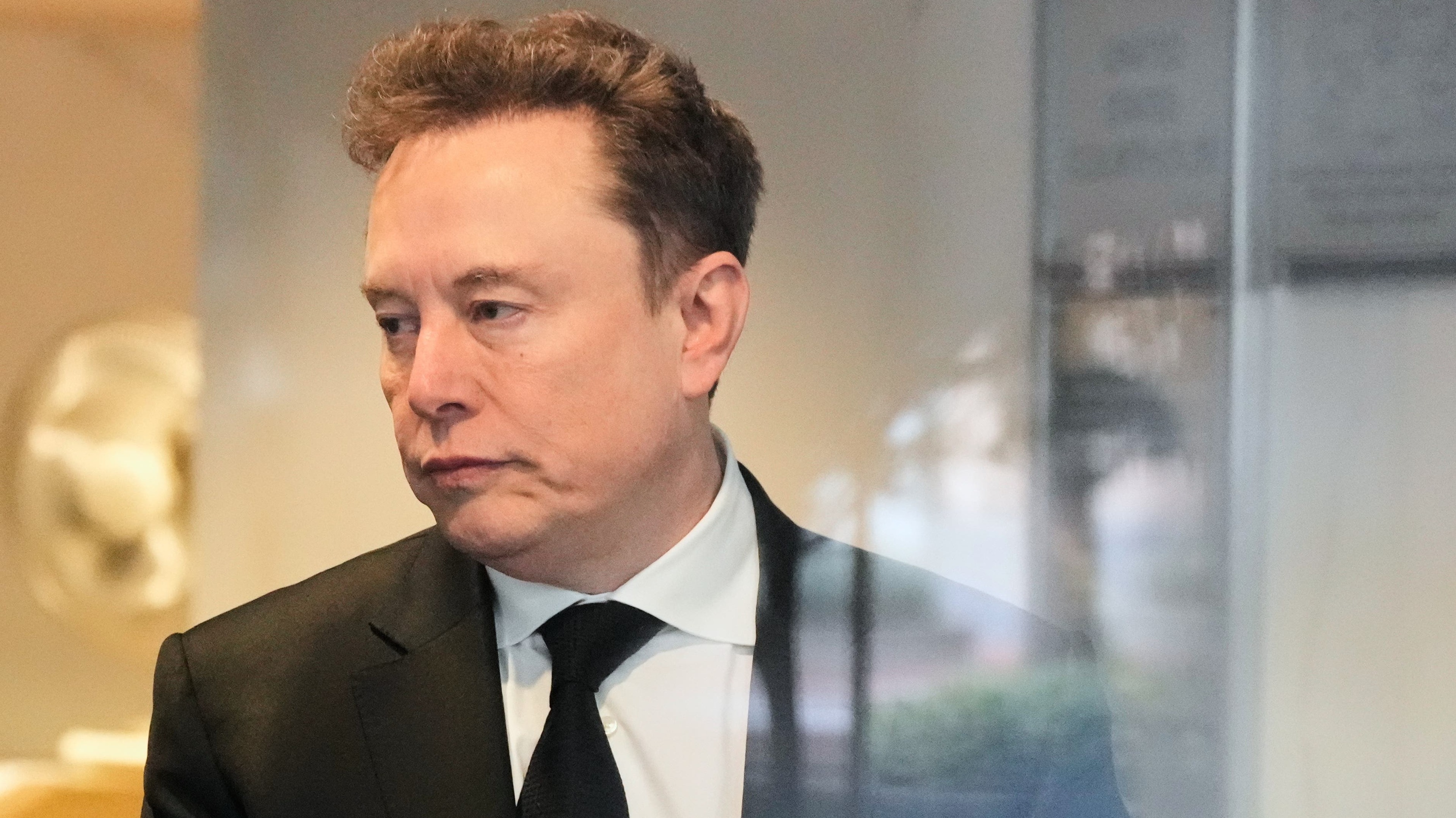 Elon Musk appears in court at start of case that could reshape AI’s future
