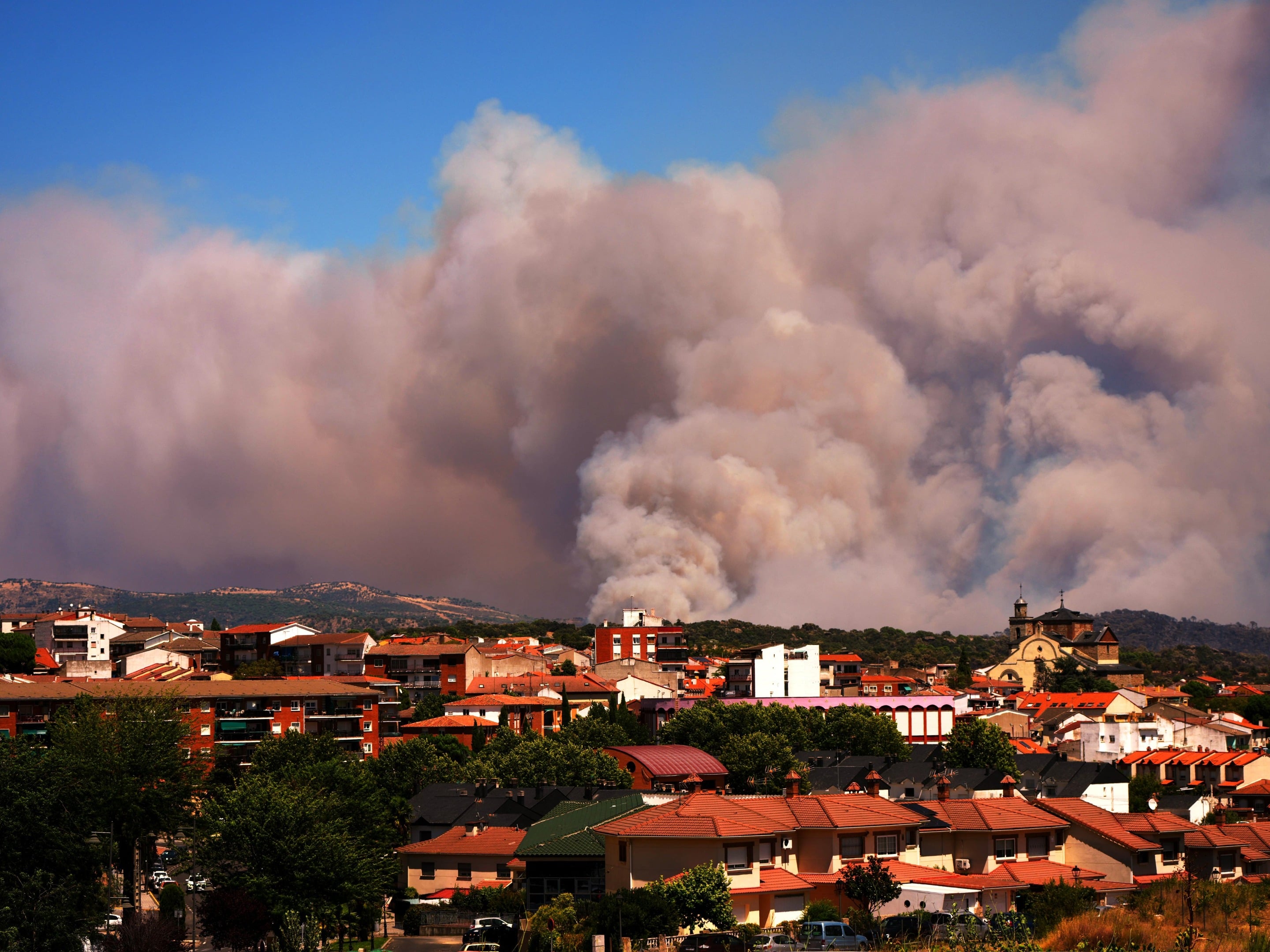 Tens of thousands of people flee raging wildfires in France and Spain | Belfast Telegraph