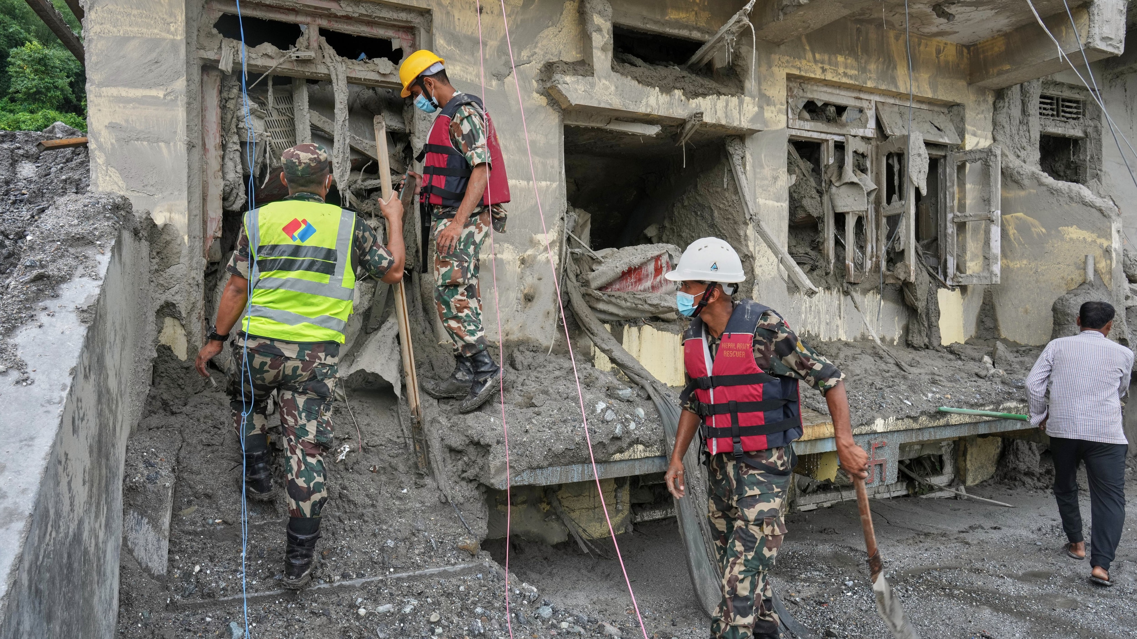 Some missing tourists contact authorities as Nepal flood death toll exceeds 1,100