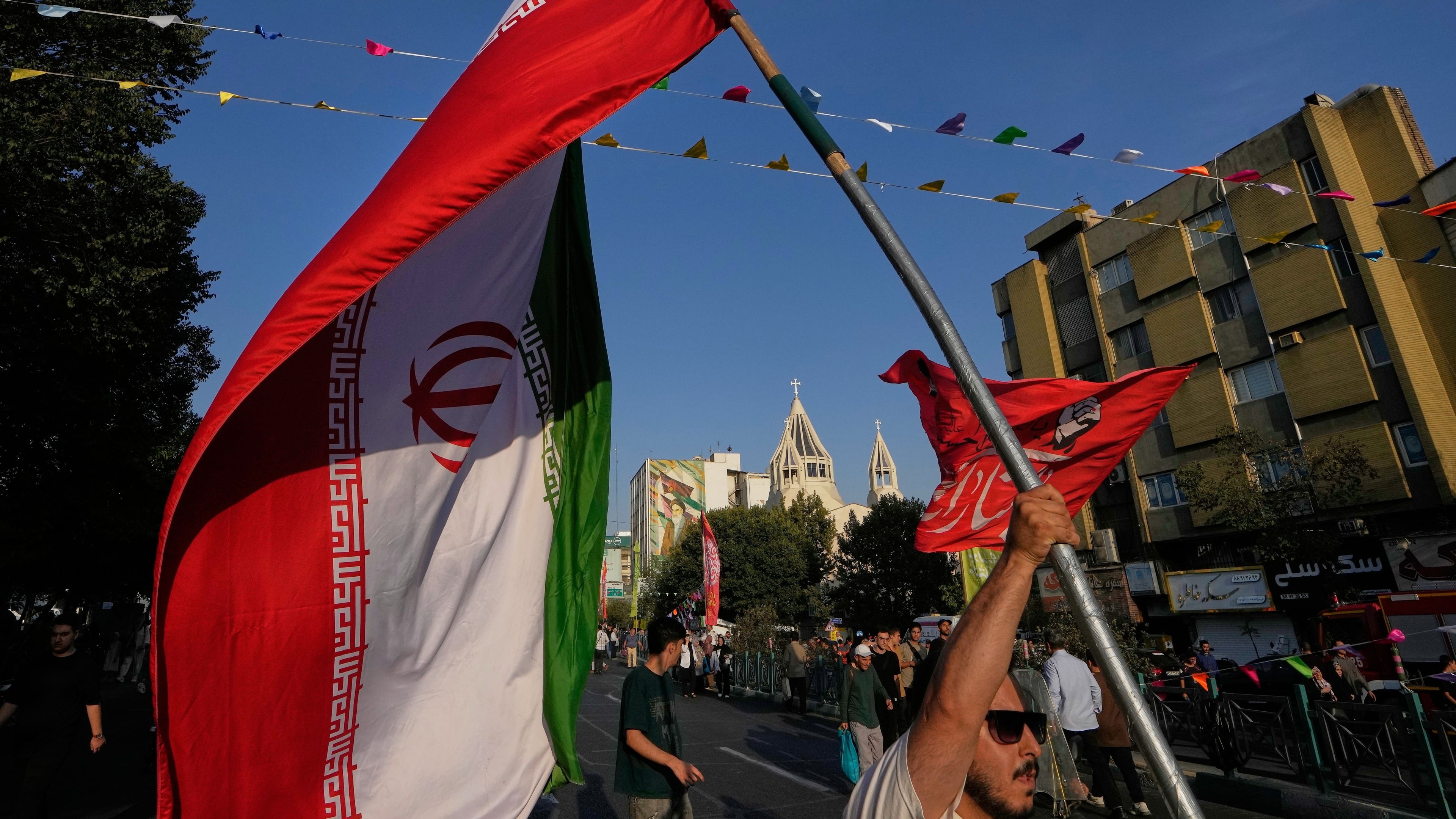 Iran fires on Gulf neighbors as Bahrain reports intercepting an attack