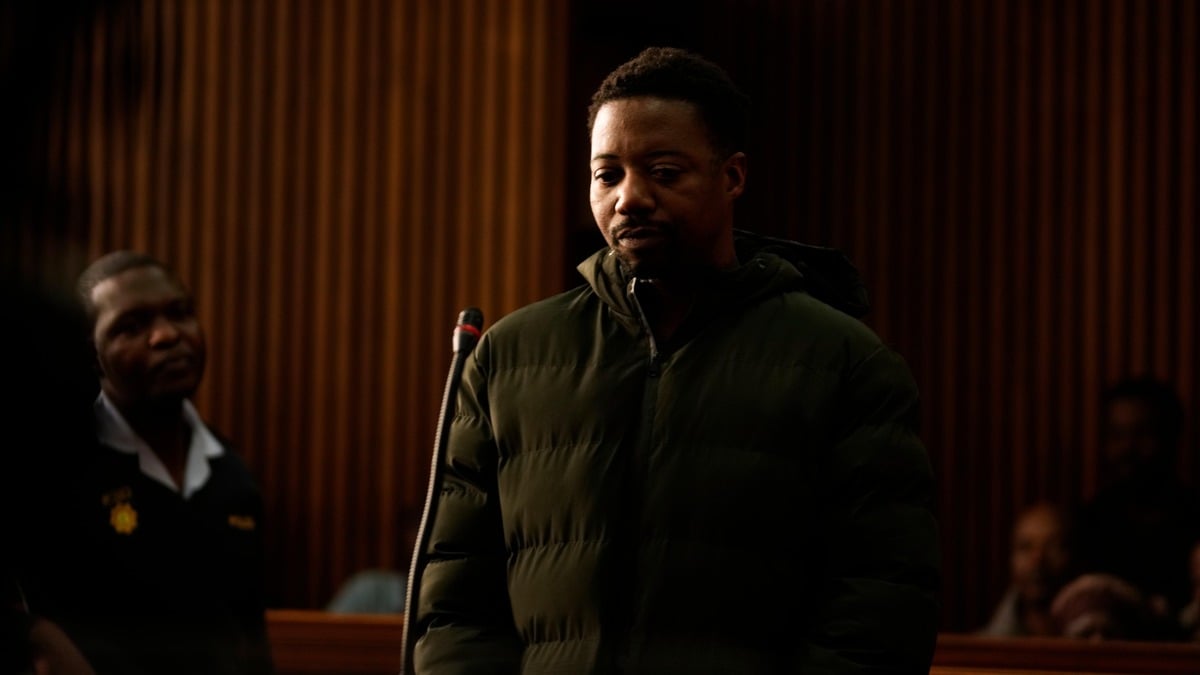 Man wanted over UK deaths of wife and daughters appears in court in South Africa
