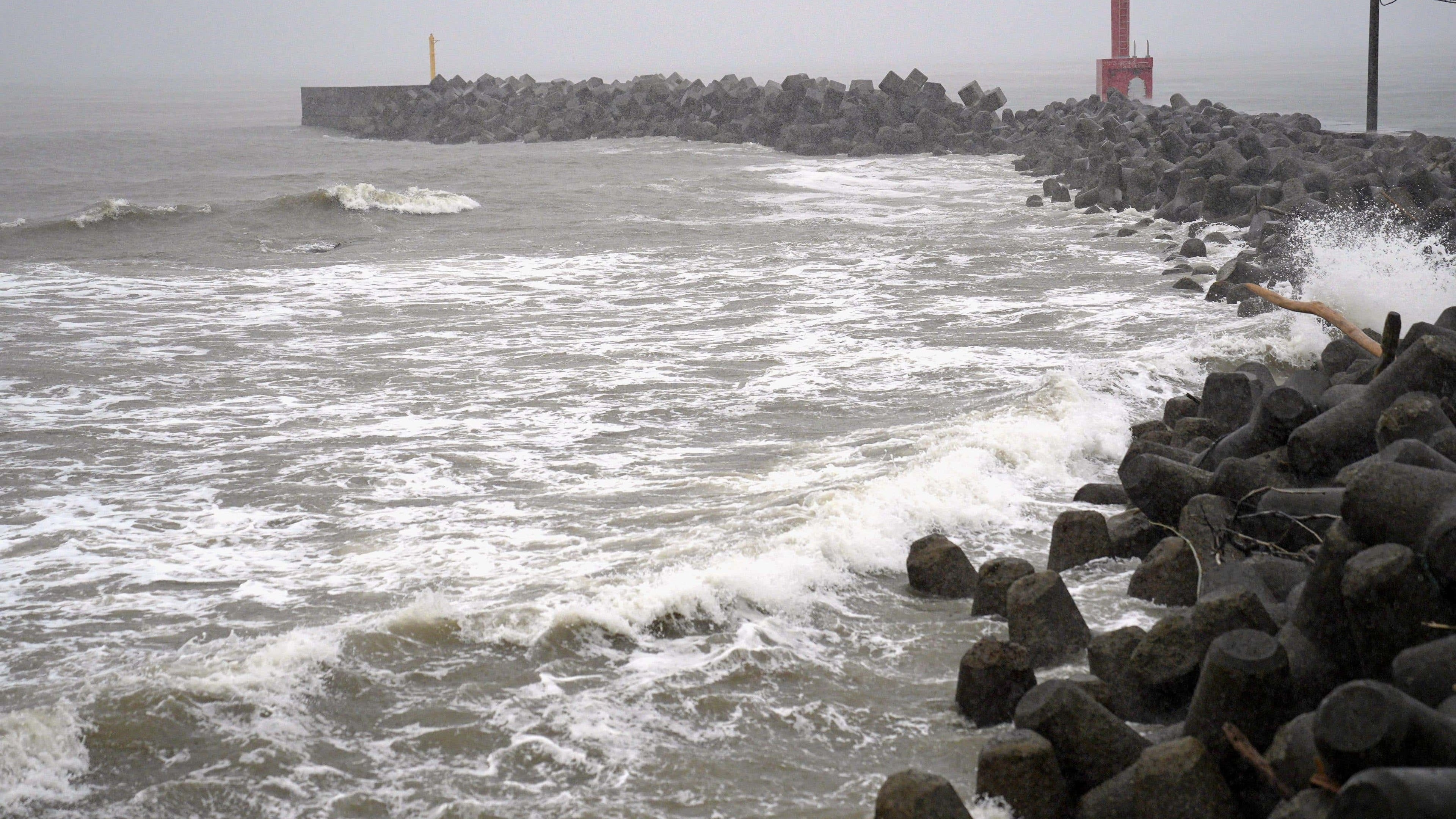 Two tropical storms hit Japan, triggering floods and landslides