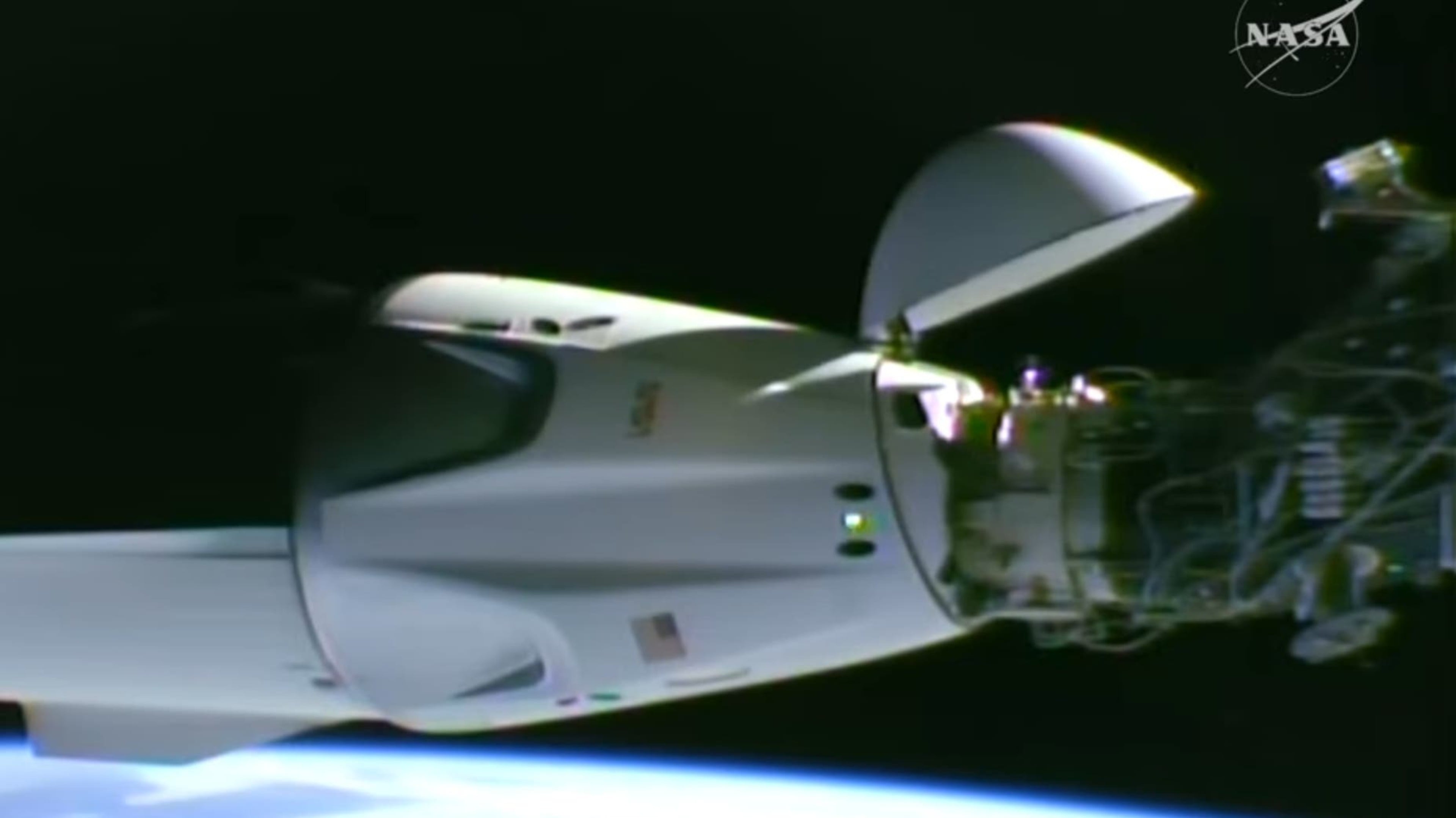 Four astronauts reach International Space Station on record-fast eight-hour U.S. launch