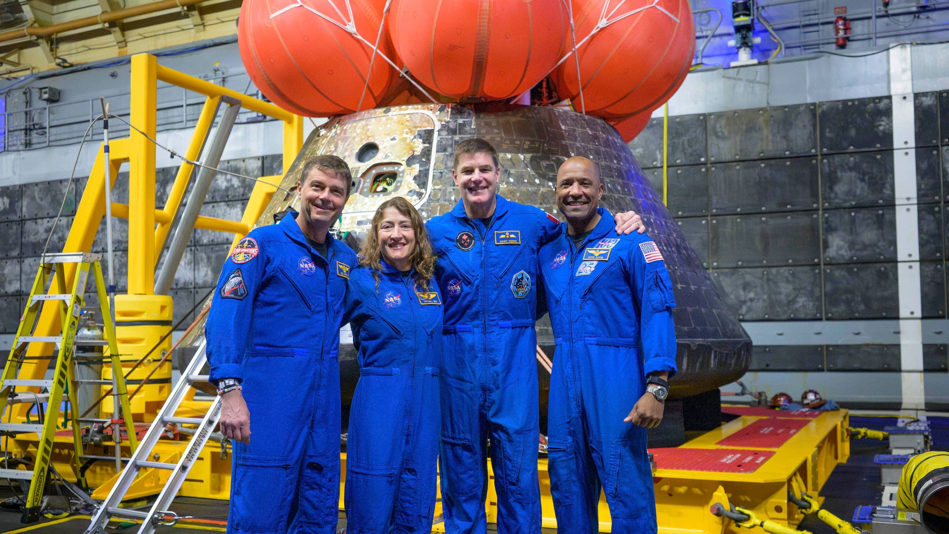 Artemis astronauts receive thunderous welcome home at Mission Control