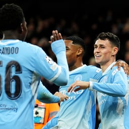 Manchester City’s Phil Foden celebrates scoring a hat-trick (Martin Rickett/PA)