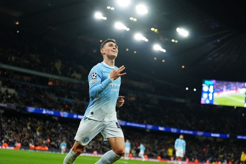 Manchester City’s Phil Foden celebrates scoring a hat-trick (Martin Rickett/PA)