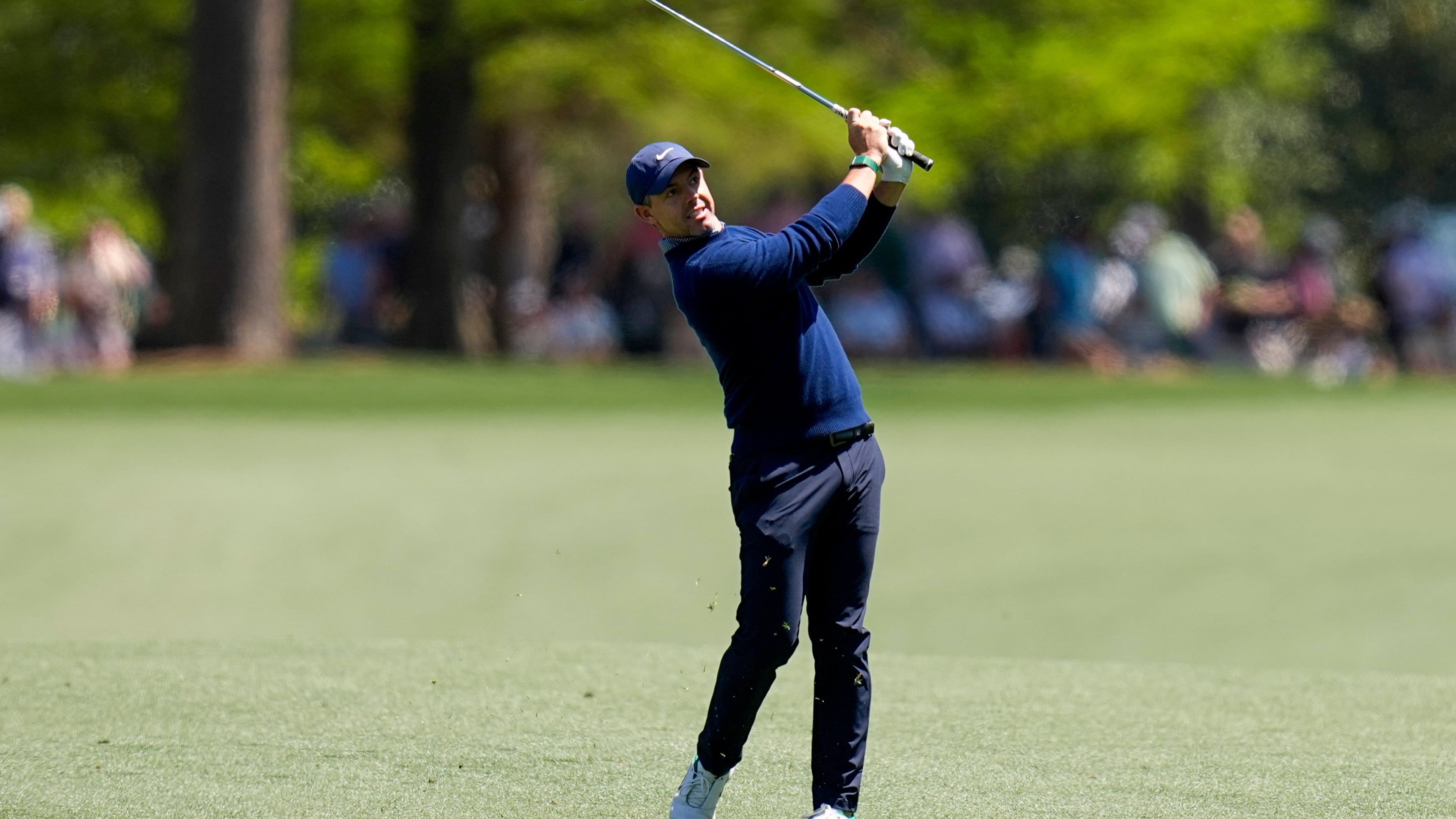 Rory McIlroy claims share of lead in hunt for back-to-back Masters victories